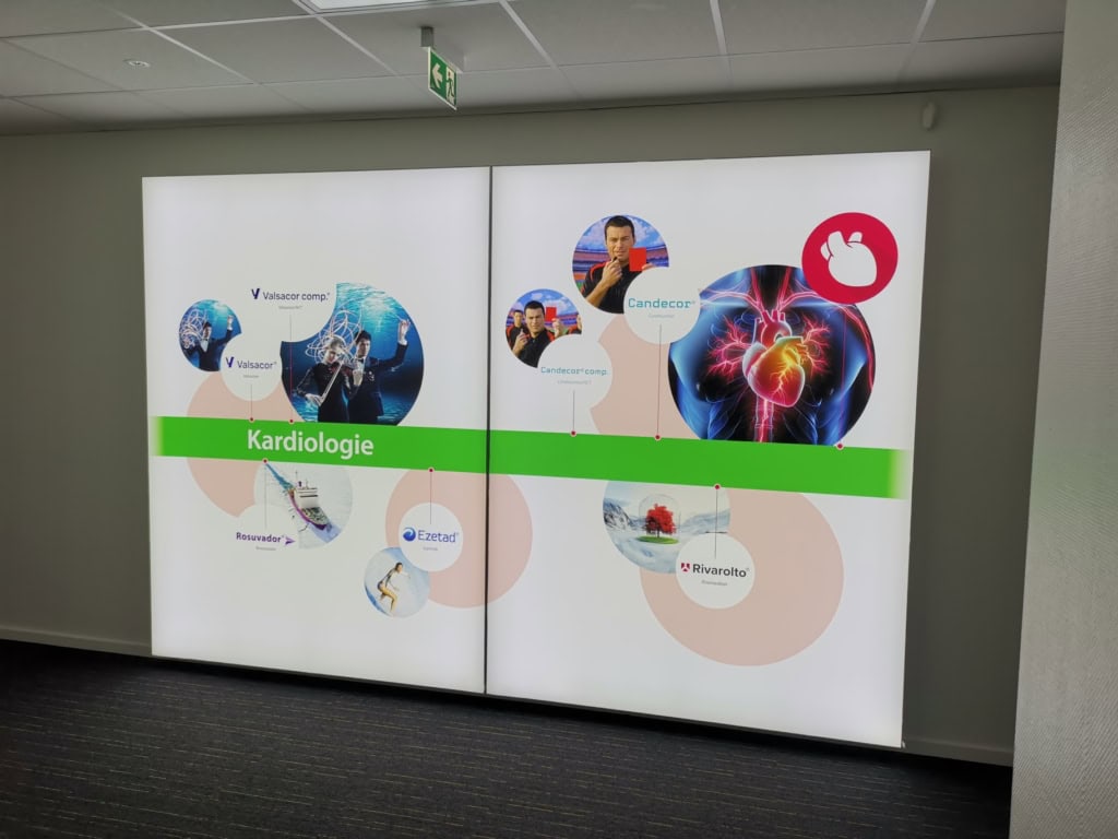 Illuminated textile graphic in a wall-mounted LED lightbox at TAD Pharma.